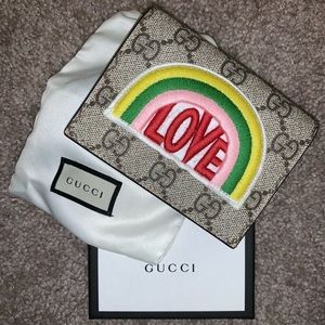 Gucci bifold monogram wallet